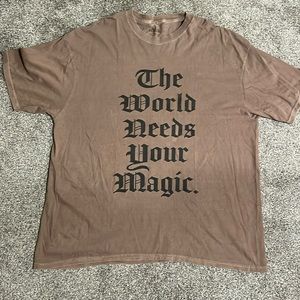 Dressed in LaLa The World Needs Your Magic Tee